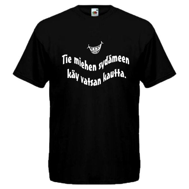 T-PAITA musta - Tie miehen sydämmeen käy vatsan kautta.